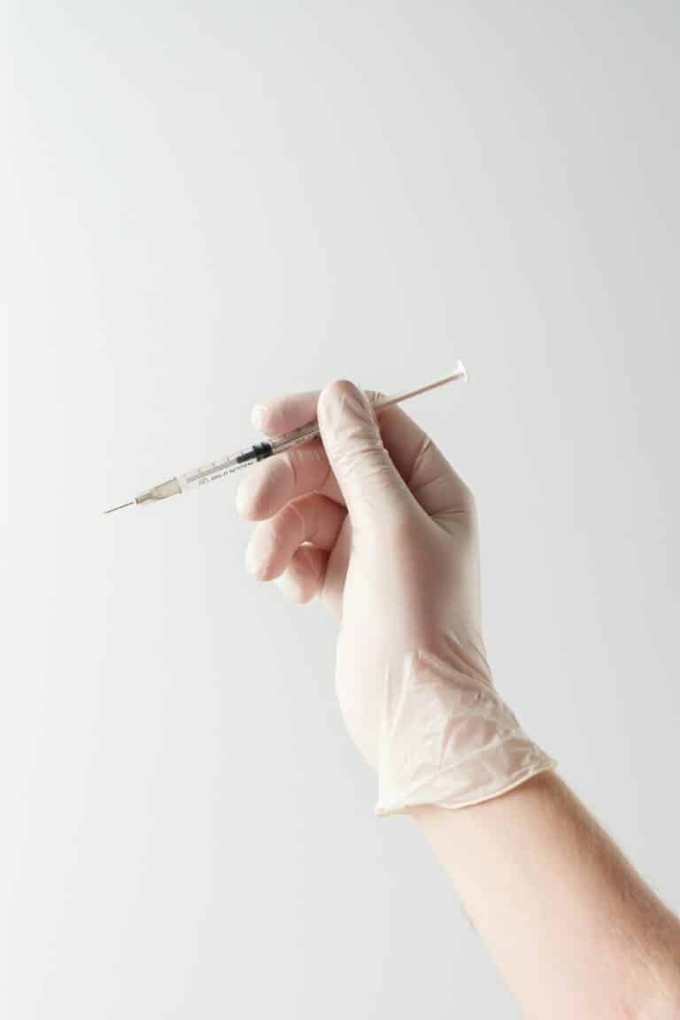 Hand Holding Injection